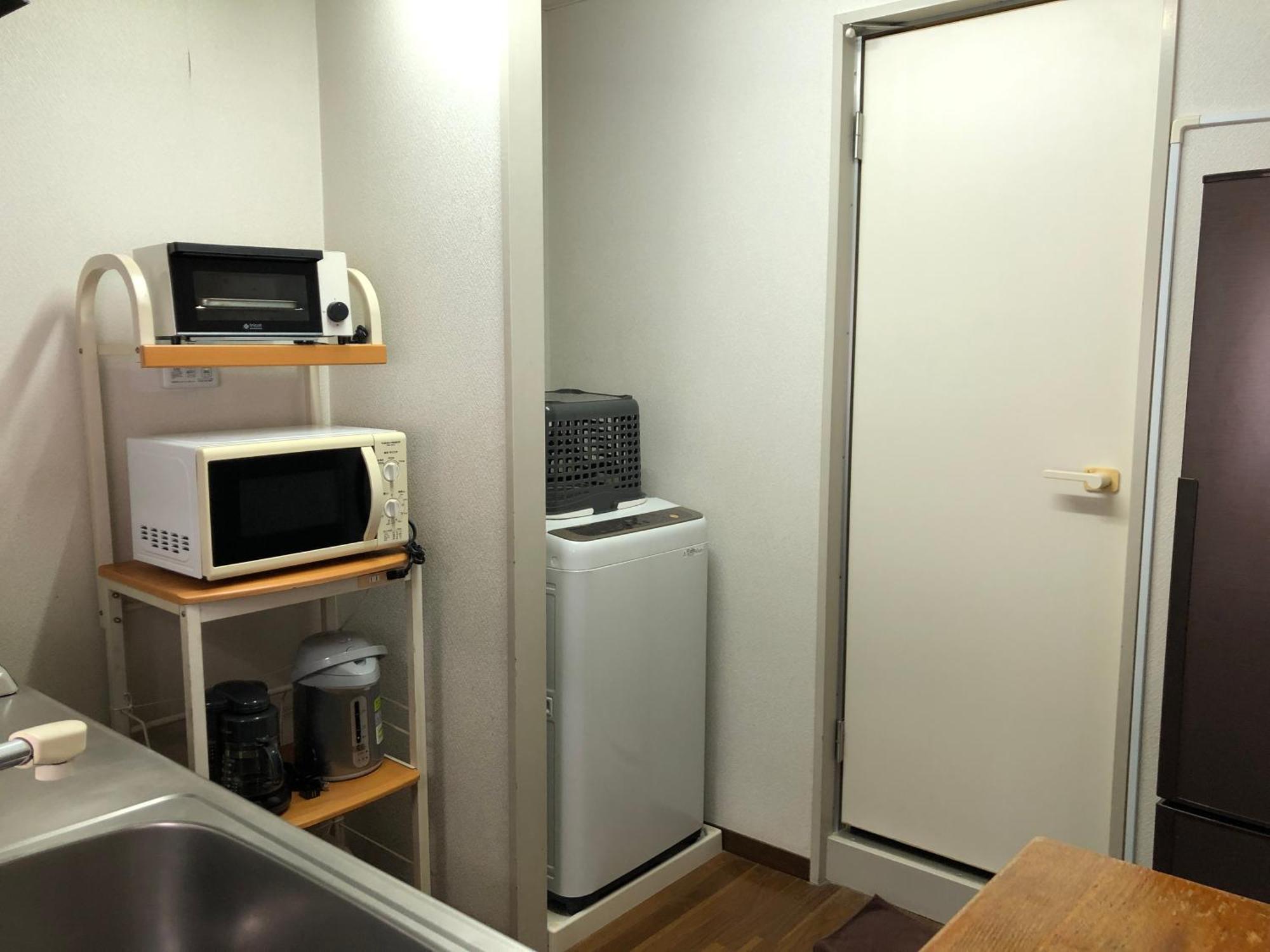 Weekly Harbourview Mansion Main Building Apartment Naha Bagian luar foto